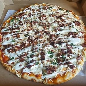Vegan BBQ Chicken Pizza with Ranch Sauce at Vegetarian Restaurant by Hakin in North Miami Beach