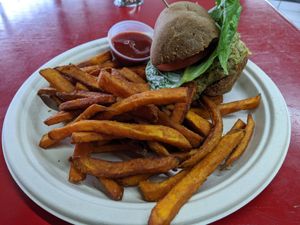 Sun burger with sweet potatoe fries at Vegetarian Restaurant by Hakin in North Miami Beach