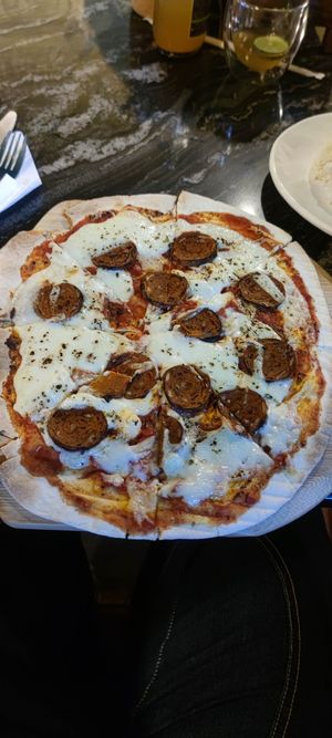 Pizza with Peperoni at The Vegan Table in Phuket