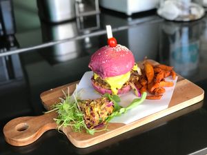 The Mushroom oat Cheeze burger with advoslaw and sweet potato fries   at The Vegan Table in Phuket