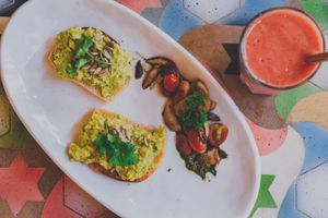 Avocado toast with pesto veggies  at The Vegan Table in Phuket