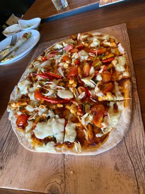 Tom Kha pizza at The Vegan Table in Phuket