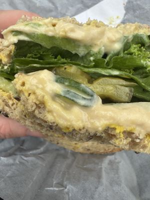 Mustard and hummus spread, lettuce, pickles and cucumbers   at Sprouts Farmers Market - Ballancroft Pkwy in Charlotte