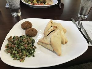 Spinach pies with a side of falafel and tabouleh at Odeh's Mediterranean Restaurant in Elko