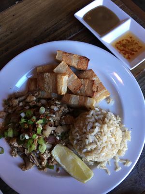 Lunch plate with two entrees: sisig and lechon kawali ($15) at Nick's on Grand in South San Francisco