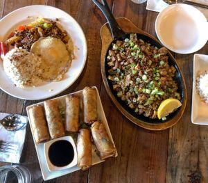 Corned beef hash, sizzling sisig, and vegetable lumpia at Nick's on Grand in South San Francisco