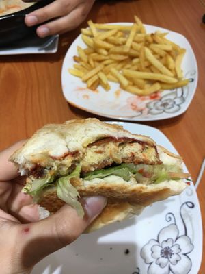 The inside of the vegan burger (deep-fried but tasty) the filling is not that big (could be more veggies inside)  at Quyet Hang in Ha Giang