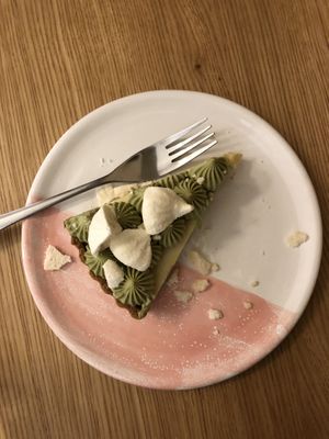Lemon tart with matcha buttercream topping and meringue  at Fika in St Petersburg