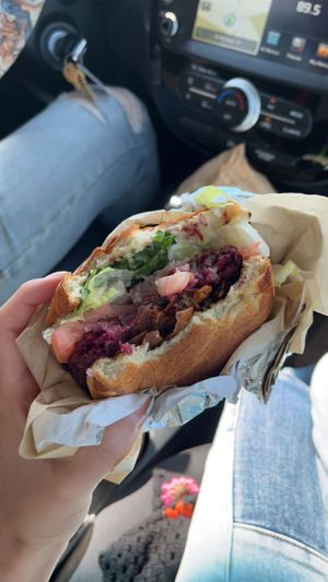 BLT burger, with some bites taken out  at Urban Beets Cafe & Juicery in Wauwatosa