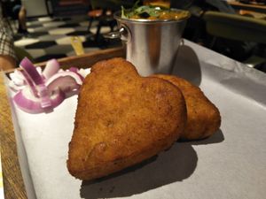 Mashed potato patties with chickpea curry at Kailash Parbat in Kowloon