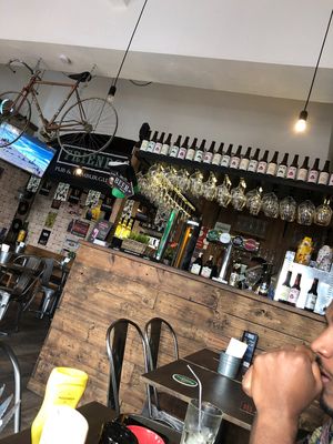 Cute place! Ace drink selection and 3 vegan burger options  at Friends in Setubal