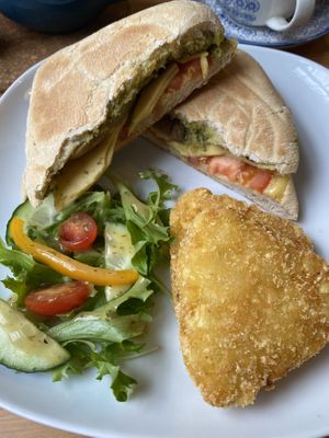 Sheese and pesto toastie with hash browns instead of crisps   at That Little Tea Shop in Romsey