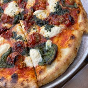 Vegan Natural Mystic Pizza featuring local vegan cheesemaker, Mad Cheese FreshElla. at Catch-a-Fire Pizza in Cincinnati