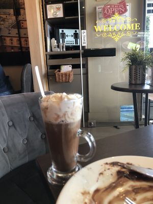 Fancy coffee w vegan whipped cream. And she made it decaf at my request    at Coffee Crepes in Paris