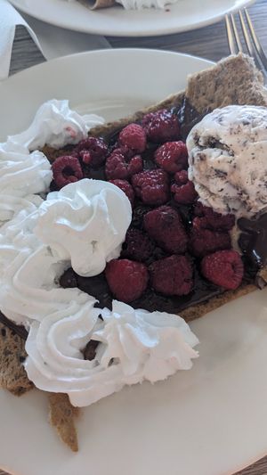 Vegan crepe with raspberries, ice cream and vegan nutella at Coffee Crepes in Paris