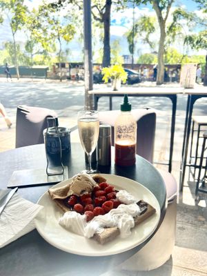 Raspberry crepes with vegan ice cream and vegan crème, and champagne by the glass   at Coffee Crepes in Paris