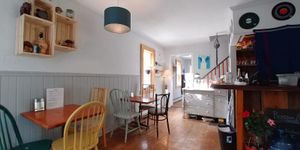 Downstairs seating at My Tiny Cupboard Fauxmagerie in Wakefield