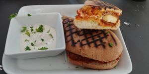 Chicken Parmesean with a garlic cream sauce. Super Delicious, a must try. $6.50 at My Tiny Cupboard Fauxmagerie in Wakefield