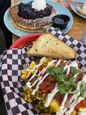 Tofu scramble in front, pancakes in the back  at Fern Cafe and Bakery in Victoria