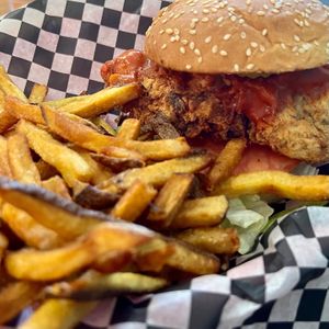 BUFFALO CHICKUN $16.50
Our crispy fried chickun tossed in spicy buffalo sauce, lettuce, tomato, mayo, pickles, on a sesame seed bun
Allergens (soy, gluten)  at Fern Cafe and Bakery in Victoria