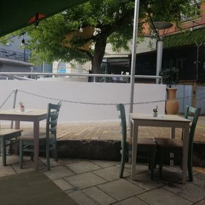 Lovely outdoor seating area at The Den Restaurant in Hereford