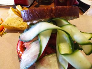 Vegan tofu mayo sandwich with potatoes and salad at Palmovka in Prague