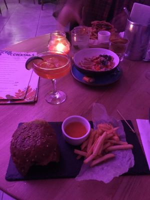 Humus, mini soy meat burger with BBQ and “Pin Up” cocktail  at Dom in Kyiv