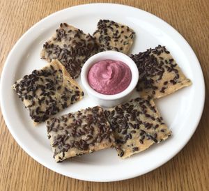 Seeded crackers with beetroot hummus  #Veganuary at Eat Well Restaurant in Dubai