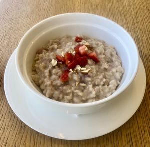 Baked strawberry almond oatmeal  at Eat Well Restaurant in Dubai