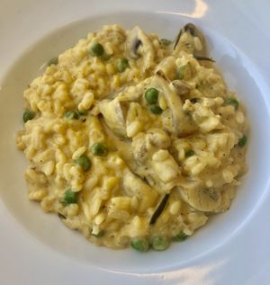 Pumpkin mushroom risotto   at Eat Well Restaurant in Dubai