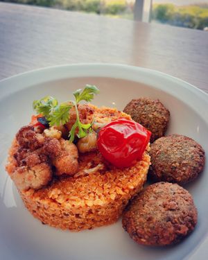 Part of the business menu of the day: quinoa risotto, falafels and roasted cauliflower  at Eat Well Restaurant in Dubai