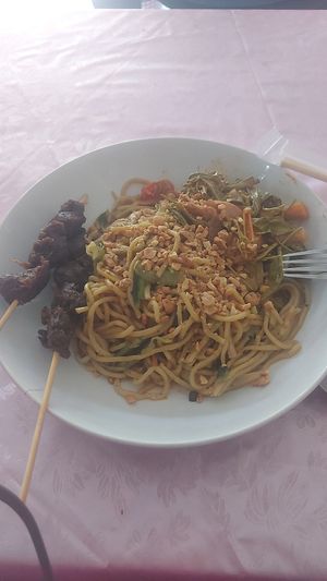 Fried noodles with vegetables and mushroom sticks at King Lio in Chiang Mai