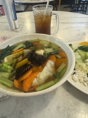 Vegan tofu and veggie rice set and ice lemon tea  at Lily's Vegetarian Cafe in Penang
