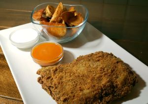 Cachopo de soja relleno de queso de anacardos ahumado. at Escafandra in Madrid