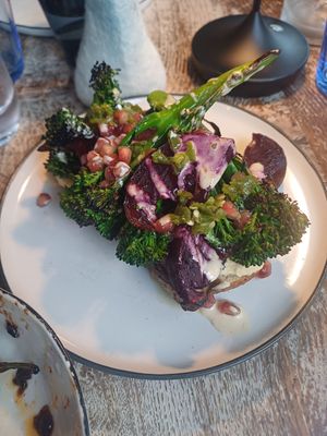 Sourdough with hummus and pomegranate and broccoli and beetroot at IV10 Cafe Bar Deli in Fortrose