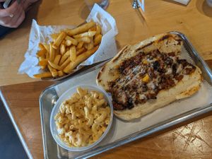 Cheesesteak with mac and cheese and fries at V-Grits and Chimera Brewing in Louisville