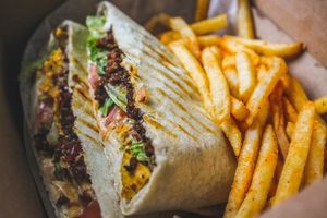 Crunchwrap with fries  at V-Grits and Chimera Brewing in Louisville