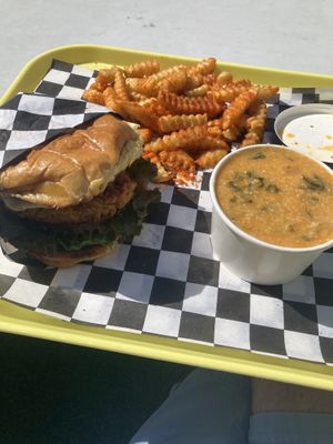 Nashville hot chicken sandwich, cheesy grits, and fries  at V-Grits and Chimera Brewing in Louisville