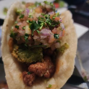 Amazing buffalo cauliflower naan tacos! at Rail Trail Flatbread Co in Hudson