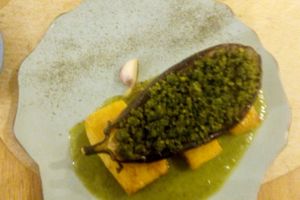 Herb crusted Aubergine on crispy polenta with pea puree at Veganapati in Lisbon