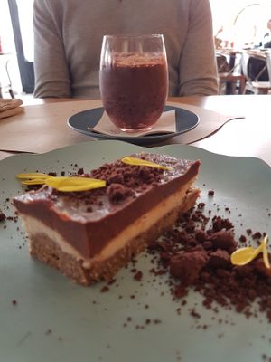 White chocolate and baobab tart and black rice kheer at Veganapati in Lisbon