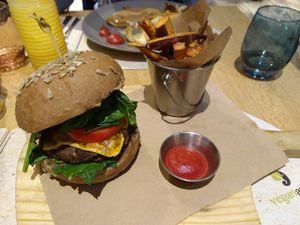 Nice Black bean Burger with sweet potato frites at Veganapati in Lisbon