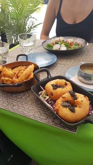 Bruschettas & bahjis really good. Not so good donuts. at Veganapati in Lisbon