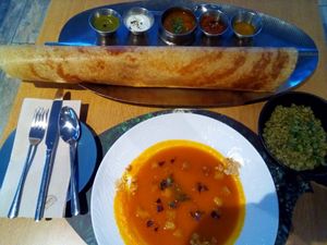 Soup, potato roll and quinoa at Veganapati in Lisbon