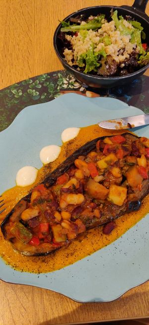 Stuffed eggplant with vegetables and quinoa salad at Veganapati in Lisbon