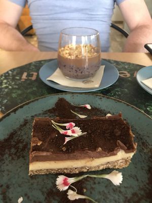 Black rice pudding and white chocolate tart desserts  at Veganapati in Lisbon