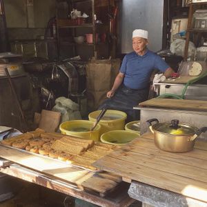 Nice man working to make the best tofu ever!  at Iriyama Tofu Shop in Kyoto
