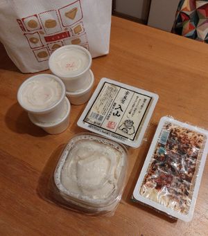 Different Tofu and soymilk. On the left, the shops special eco bag!! at Iriyama Tofu Shop in Kyoto