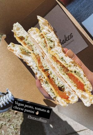 Vegan pesto, cheese & tomato panini at Bora Coffee Co in Shirley