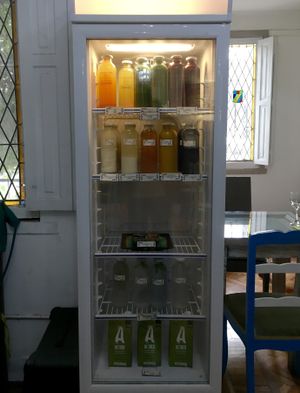 cold pressed juices and plant milks on display at Kiwicha in Santiago